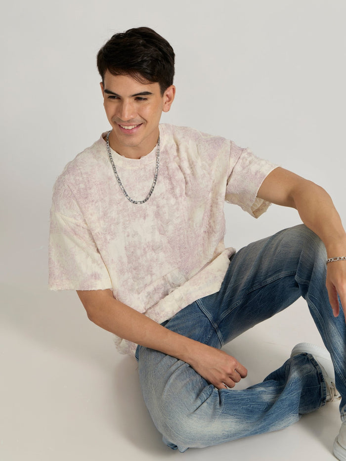 man wearing a Distressed Oversized T-Shirt - Pink