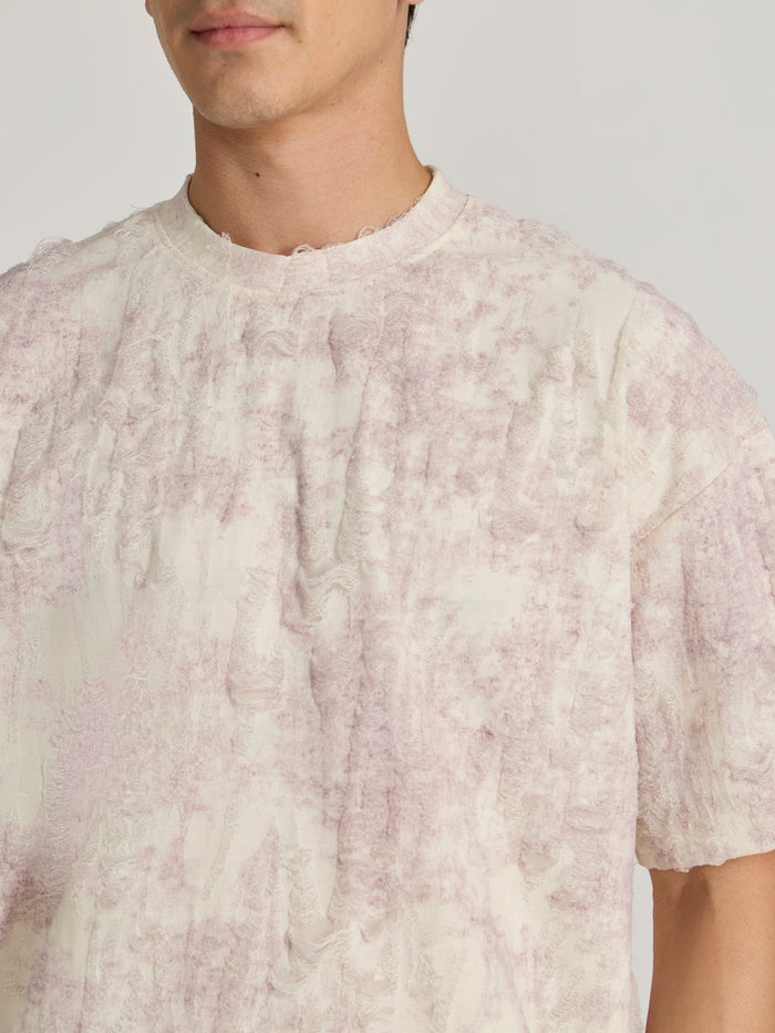 man wearing a Distressed Oversized T-Shirt - Pink