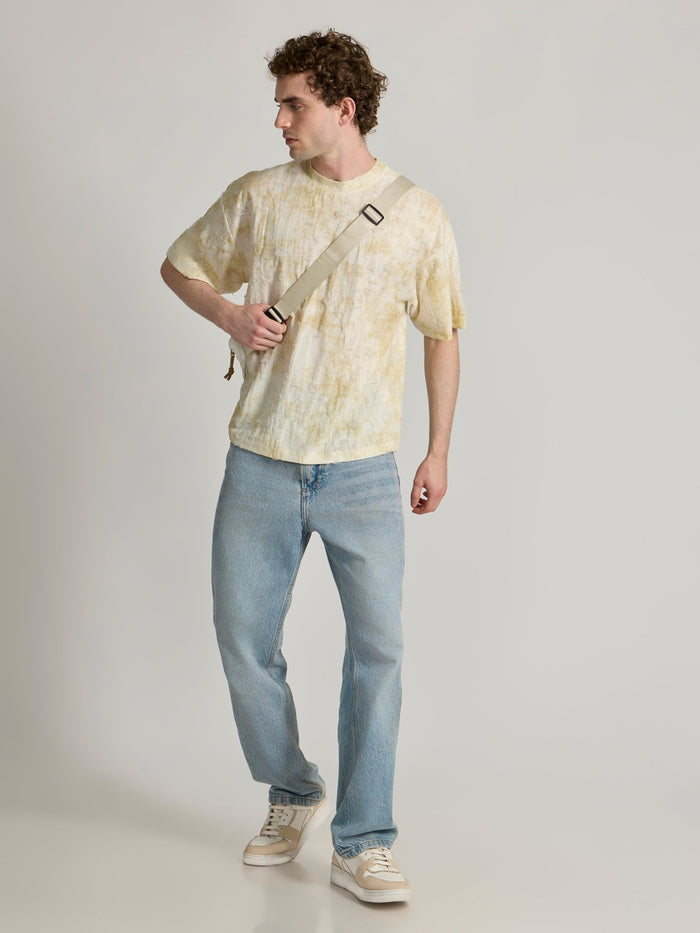 man wearing a Distressed Oversized T-Shirt - yellow