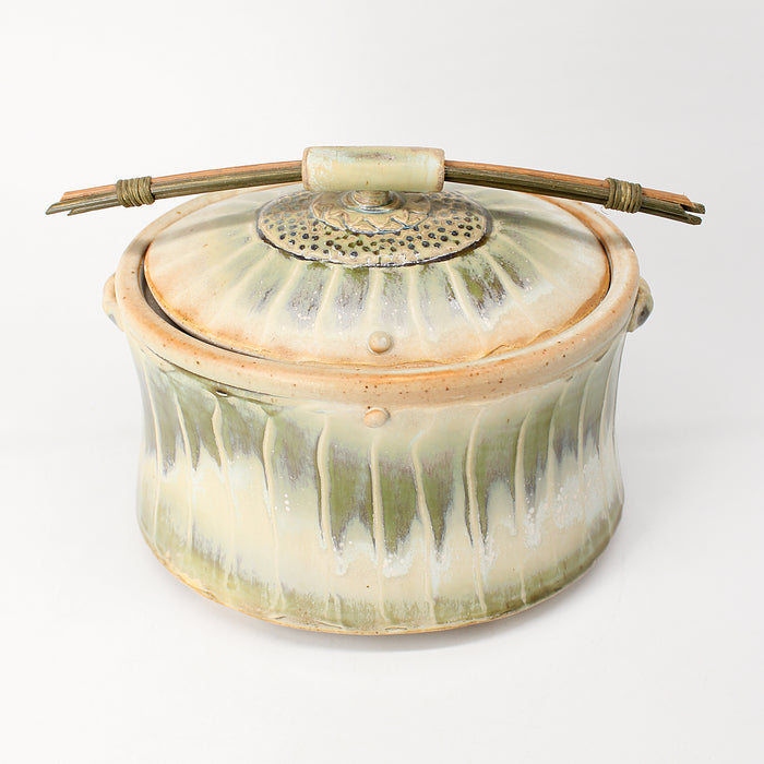Green Lidded Decor Piece With Reeds