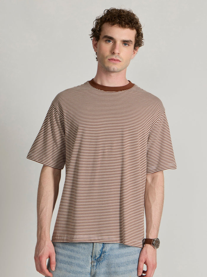 Man wearing a brown striped crew t-shirt