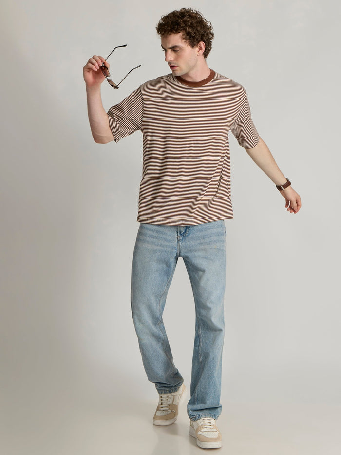 Man wearing a brown striped crew t-shirt