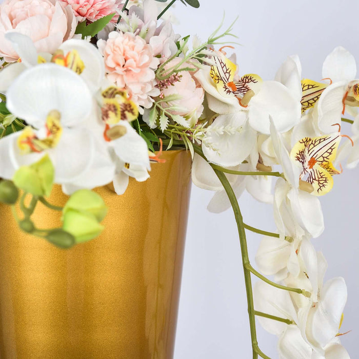 Gold vase with white orchids and pink flowers