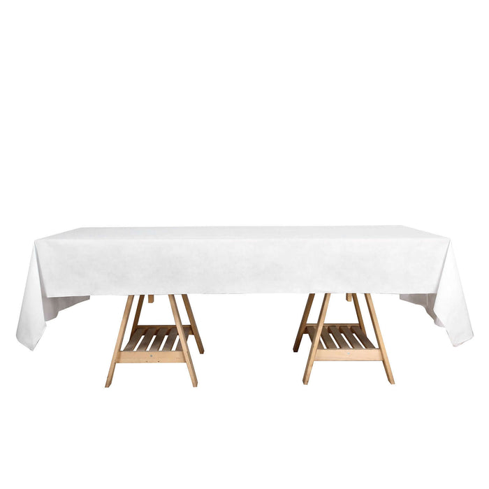 White tablecloth draped over a wooden folding table #whtbkgd