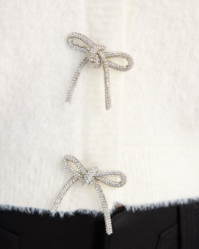 Ivory $|& Sadie & Sage Porcelain Cardigan with Rhinestone Bows - SOF Detail