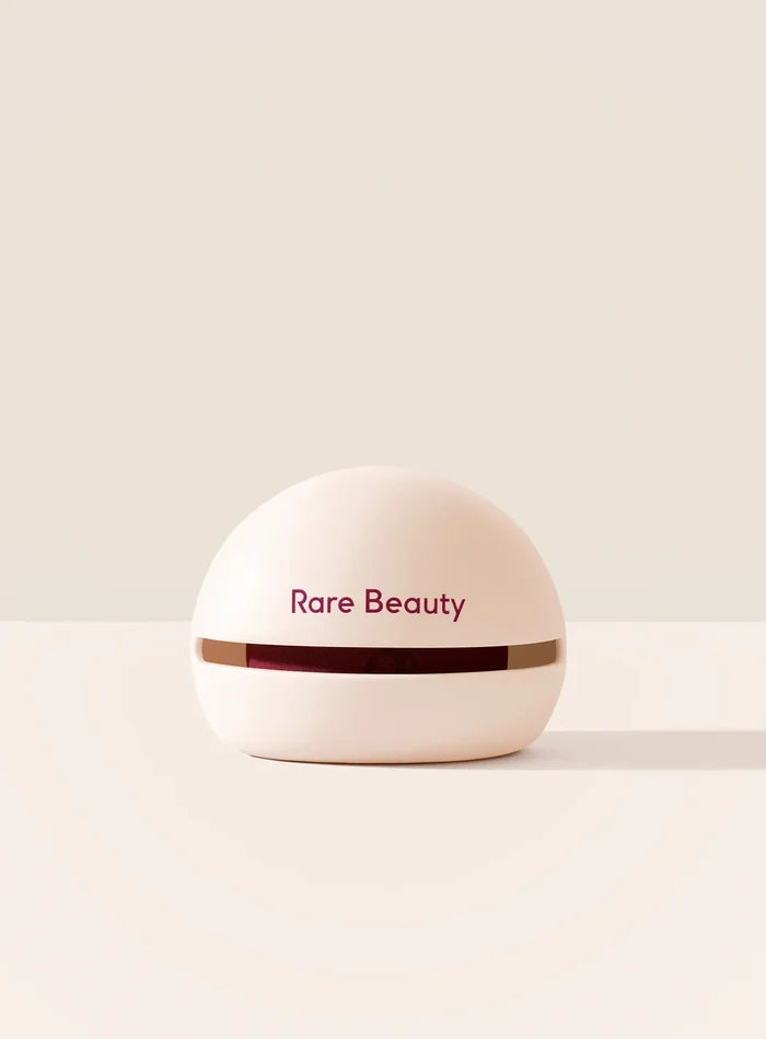 Estuche para esponja de maquillaje Rare Beauty color crema