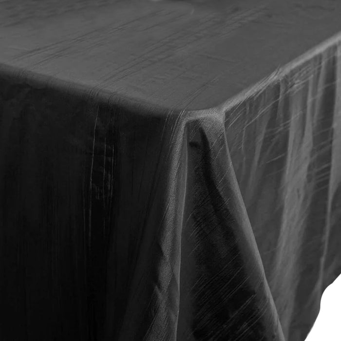 Black tablecloth draped elegantly over a table edge.