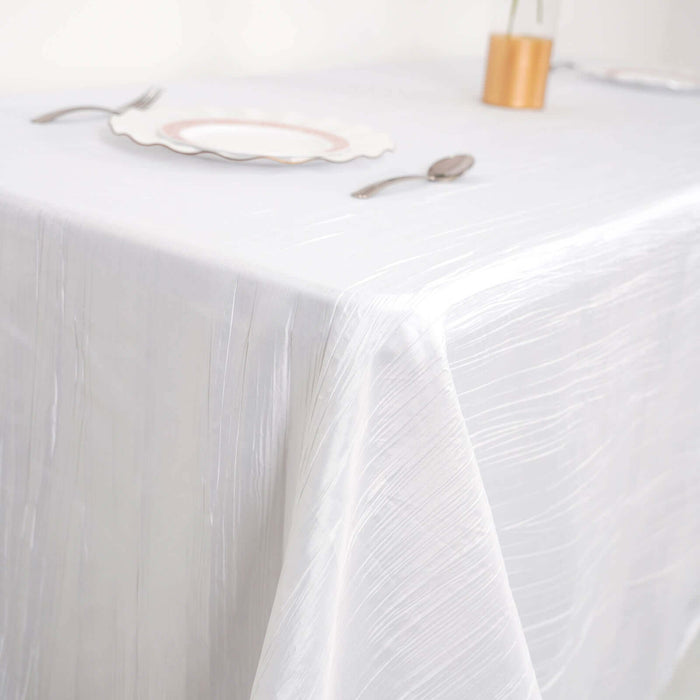 Elegant white tablecloth with subtle texture, perfect for dining settings.