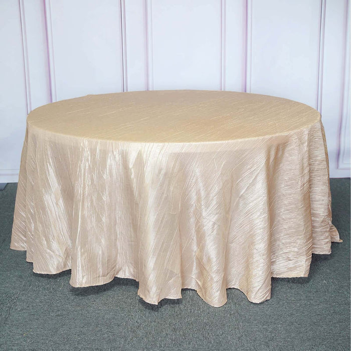 Round gold tablecloth on an oval table.