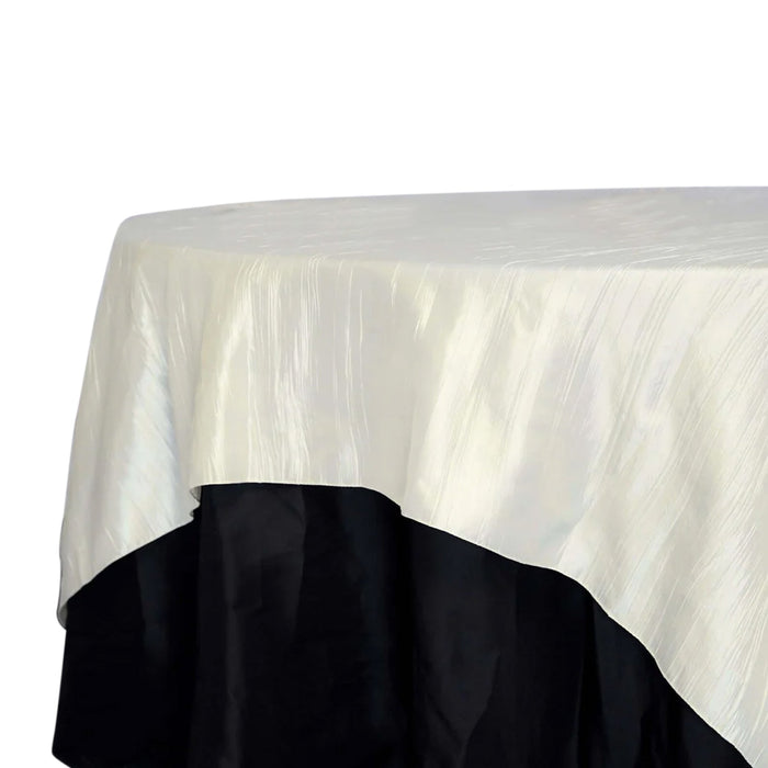 Elegant cream and black tablecloth with a smooth, shiny finish.