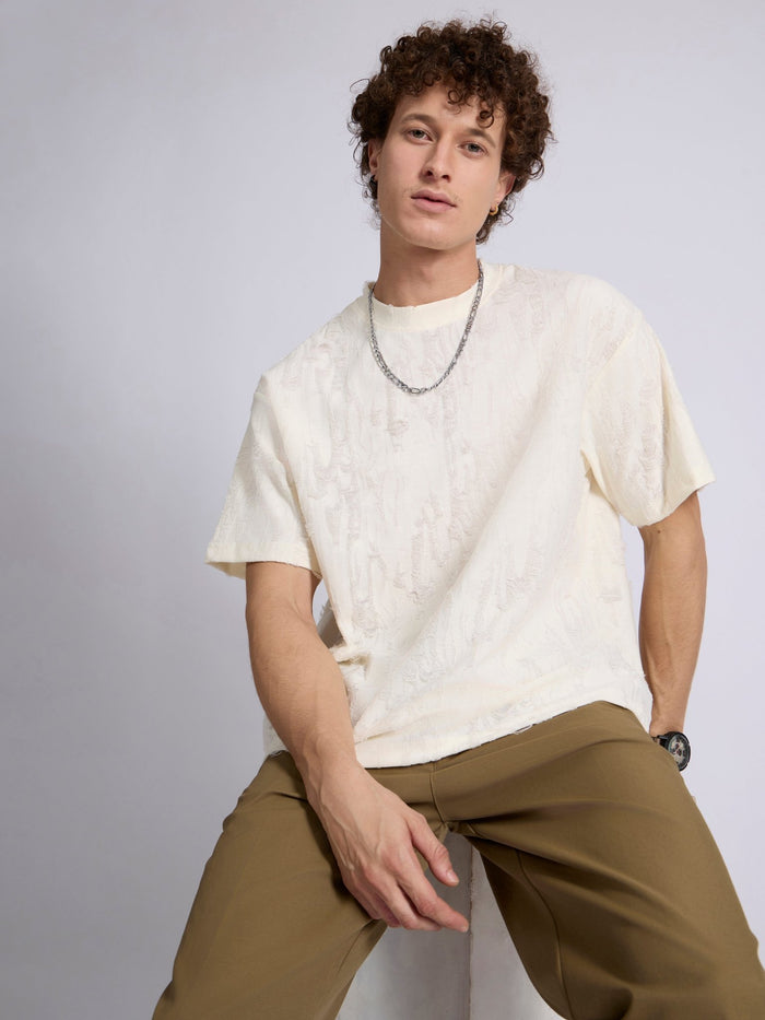 men's distressed T Shirt in cream